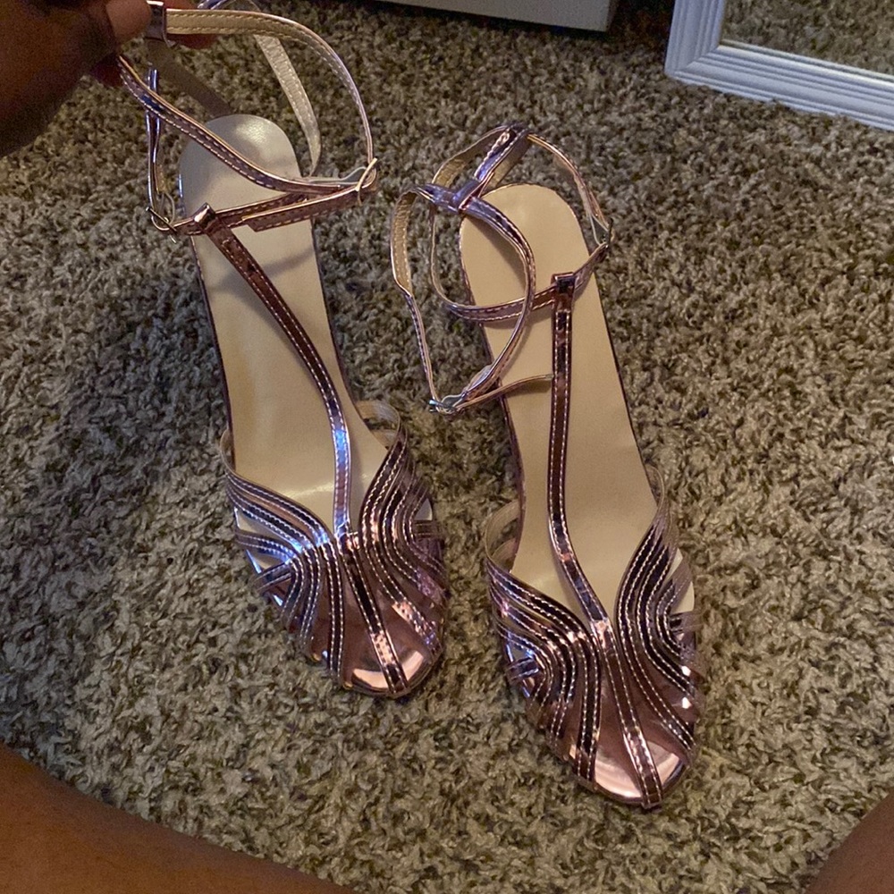 Metallic pink heels.